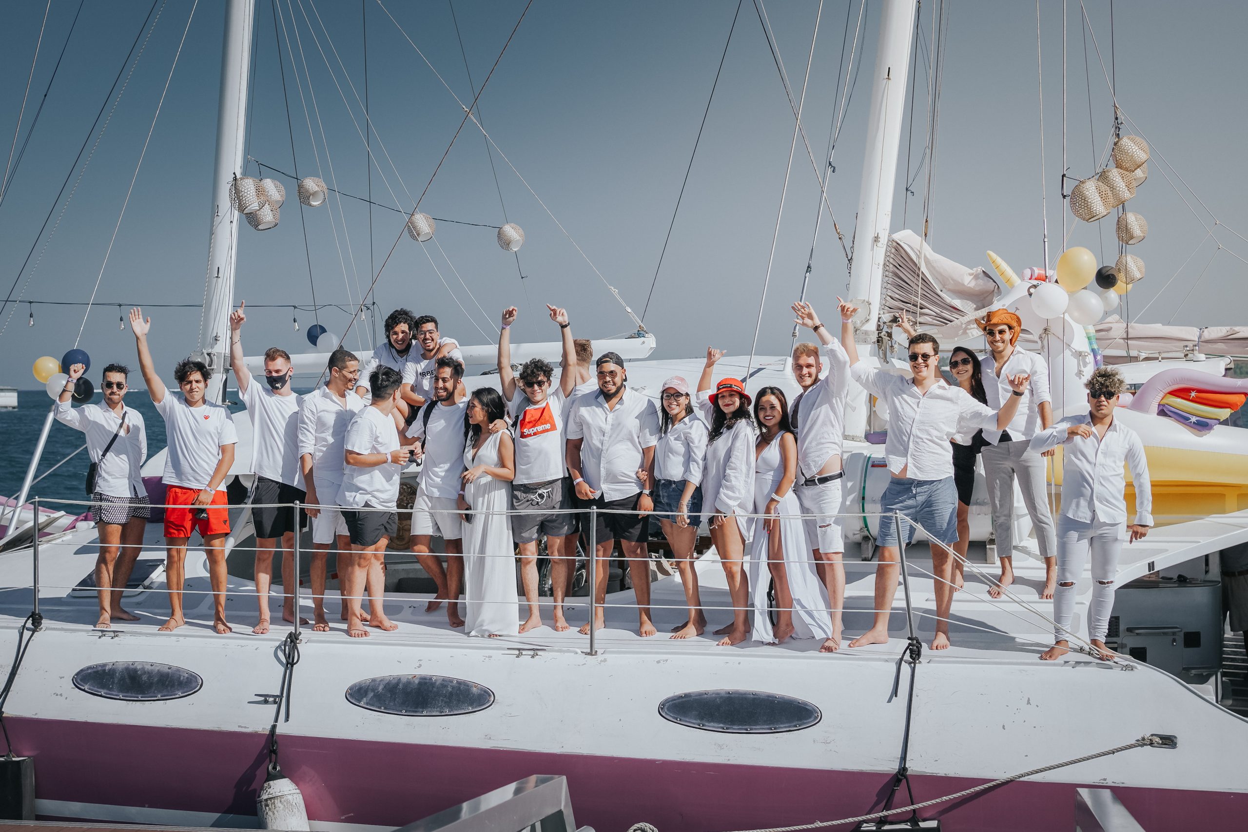 Yacht deck setup with dining and lounge seating